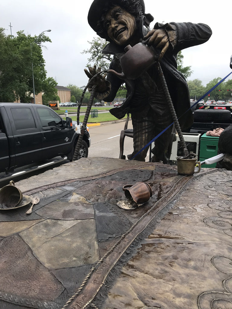 Sculptor Bridgette Mongeon's Mad Hatter and tea pot ready to install.