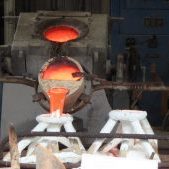 Making a bronze, and pouring the metal.